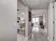 Bright entryway with tile flooring, leading to living area at 2438 Enterprise Rd # 6, Clearwater, FL 33763