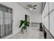 Spacious sunroom with a view, tile floor, and plenty of natural light at 2438 Enterprise Rd # 6, Clearwater, FL 33763