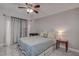 Cozy bedroom with a comfortable bed and ceiling fan at 2438 Enterprise Rd # 6, Clearwater, FL 33763