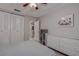 Bedroom with ample closet space and dresser at 2438 Enterprise Rd # 6, Clearwater, FL 33763