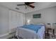 Cozy bedroom featuring a double bed, built-in closet, and ceiling fan at 2438 Enterprise Rd # 6, Clearwater, FL 33763