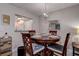 Dining area with table and chairs, kitchen view at 2438 Enterprise Rd # 6, Clearwater, FL 33763