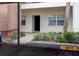 Well-maintained building entrance with landscaping at 2438 Enterprise Rd # 6, Clearwater, FL 33763