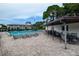 Inviting community pool area with multiple lounge chairs and shaded seating at 2438 Enterprise Rd # 6, Clearwater, FL 33763