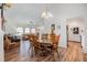 Bright dining room with a wood table and chairs, kitchen view at 13199 Drysdale St, Spring Hill, FL 34609