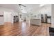 Kitchen with island, stainless steel appliances, and hardwood floors at 13199 Drysdale St, Spring Hill, FL 34609