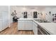 Kitchen features a breakfast bar and light wood flooring at 13199 Drysdale St, Spring Hill, FL 34609