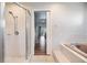 Bathroom features a walk-in shower and garden tub at 13199 Drysdale St, Spring Hill, FL 34609