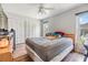 Bedroom with a queen bed and access to the pool at 13199 Drysdale St, Spring Hill, FL 34609