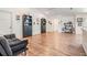 Living room with hardwood floors and built-in shelving at 13199 Drysdale St, Spring Hill, FL 34609