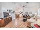 Bright and airy living room with hardwood floors and ample seating space at 13199 Drysdale St, Spring Hill, FL 34609