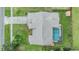 Overhead view of house and backyard pool at 13199 Drysdale St, Spring Hill, FL 34609