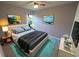 Bedroom featuring soft grey walls, stylish decor, a comfy bed, and modern bedside tables at 3422 29Th E St, Bradenton, FL 34208