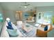 Comfortable living room includes modern decor and natural light with easy access to the kitchen and backyard at 3422 29Th E St, Bradenton, FL 34208
