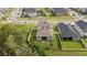 Aerial view of house and backyard with fence at 9848 Wild Begonia Loop, Land O Lakes, FL 34637