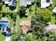 Aerial view of house and surrounding neighborhood with green lawns at 3422 29Th E St, Bradenton, FL 34208