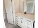 Modern bathroom with white vanity, quartz countertop, and patterned floor tile at 3422 29Th E St, Bradenton, FL 34208