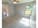 Bright bedroom with tile floors and a view of the backyard at 3422 29Th E St, Bradenton, FL 34208