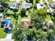 Aerial view of house and surrounding neighborhood with green lawns at 3422 29Th E St, Bradenton, FL 34208