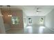 Bright living room with tile floors, vaulted ceiling and sliding glass doors at 3422 29Th E St, Bradenton, FL 34208