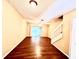 Spacious living room with laminate flooring and access to a patio at 8628 Hunters Key Cir, Tampa, FL 33647