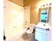 Full bathroom featuring a bathtub, toilet, and vanity at 8628 Hunters Key Cir, Tampa, FL 33647