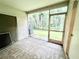 Cozy screened porch overlooking a lush green backyard at 8628 Hunters Key Cir, Tampa, FL 33647