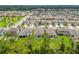 Wide shot of a neighborhood with houses, streets and a park at 30351 Marquette Ave, Wesley Chapel, FL 33545