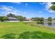 Spacious backyard with lake view at 9506 Pebble Glen Ave, Tampa, FL 33647