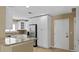 Kitchen with granite countertops and white cabinetry at 9506 Pebble Glen Ave, Tampa, FL 33647