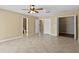 Large bedroom with ample closet space and bathroom access at 9506 Pebble Glen Ave, Tampa, FL 33647