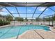 Relaxing kidney-shaped pool with spa at 9506 Pebble Glen Ave, Tampa, FL 33647