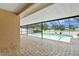 Inviting pool area with screened enclosure at 9506 Pebble Glen Ave, Tampa, FL 33647