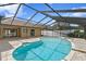 Large pool with spa and screened enclosure at 9506 Pebble Glen Ave, Tampa, FL 33647
