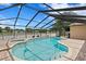 Lovely pool with spa and screened enclosure at 9506 Pebble Glen Ave, Tampa, FL 33647