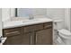 Bathroom with a white countertop vanity and toilet at 20783 Balsam Hill Rd, Land O Lakes, FL 34638