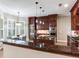 Open kitchen with large island, breakfast bar, and stainless steel appliances at 2501 N Dundee St, Tampa, FL 33629