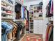 Large walk-in closet with ample shelving and hanging space at 2501 N Dundee St, Tampa, FL 33629