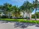 Two-story home with lush landscaping and palm trees at 2501 N Dundee St, Tampa, FL 33629