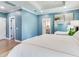 Main bedroom with ensuite bathroom and hardwood floors at 2501 N Dundee St, Tampa, FL 33629