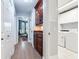 Laundry room with washer, dryer, and built-in cabinets at 2501 N Dundee St, Tampa, FL 33629