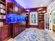 Home office with built-in bookcase and large aquarium at 2501 N Dundee St, Tampa, FL 33629