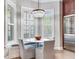 Bright breakfast nook with built-in seating and a chandelier at 2501 N Dundee St, Tampa, FL 33629