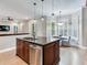 Eat-in kitchen with large island, granite countertops, and stainless steel appliances at 2501 N Dundee St, Tampa, FL 33629