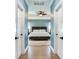 Spacious main bedroom with ceiling fan and light blue walls at 2501 N Dundee St, Tampa, FL 33629