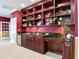 Game room bar with granite countertop and wood cabinets at 2501 N Dundee St, Tampa, FL 33629