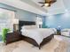 Serene bedroom featuring a king-size bed and ample natural light at 2501 N Dundee St, Tampa, FL 33629