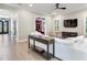 Living room boasts a comfy sectional sofa and a large TV at 2501 N Dundee St, Tampa, FL 33629