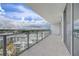 Private balcony boasting panoramic views of the cityscape and lush surroundings at 5120 Marina Way # 10008, Tampa, FL 33611