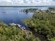 Aerial view of waterfront property with private boat docks at 2511 Dolly Bay Dr # 301, Palm Harbor, FL 34684